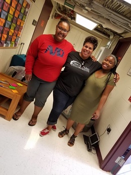 Kenyaa, Deanna Reed and Tatiana pose for a photo at the Female Institute