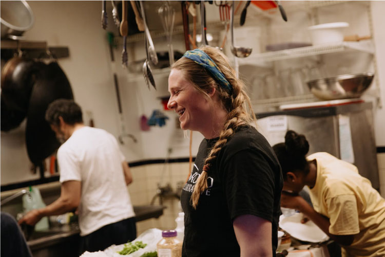 Livvy smiles in the kitchen during an On the Road program